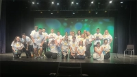 group of soar and strive students on a stage